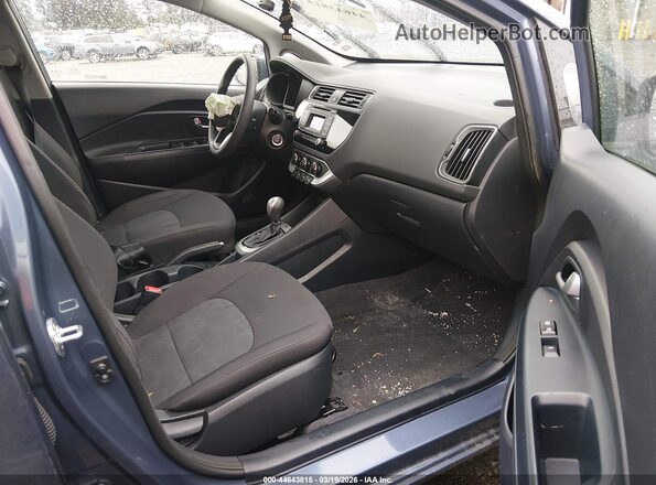 KNADM4A39G6676750 2016 KIA RIO Blue Вид салону спереду