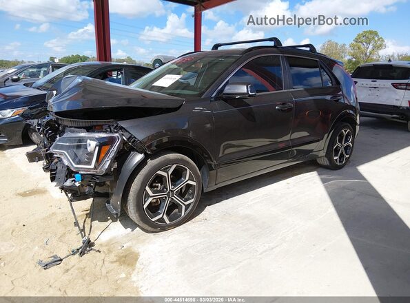 KNDCR3LE9P5074686 2023 KIA NIRO Black Vista tres cuartos delantera izquierda