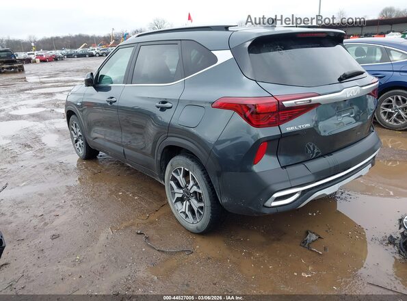 KNDERCAA3P7467953 2023 KIA SELTOS Gray Trasero izquierdo