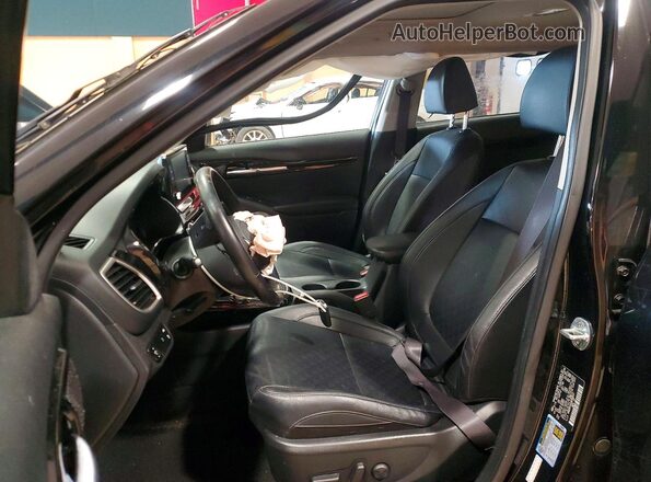 KNDERCAAXM7129137 2021 KIA SELTOS Black Front interior view