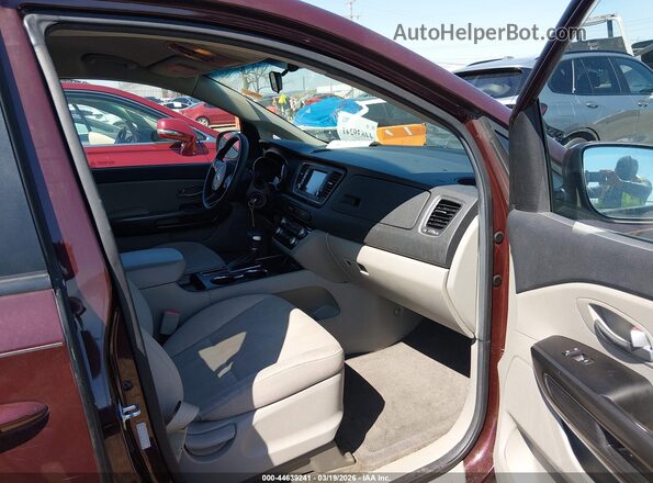 KNDMB5C14K6533501 2019 KIA SEDONA Maroon Front interior view