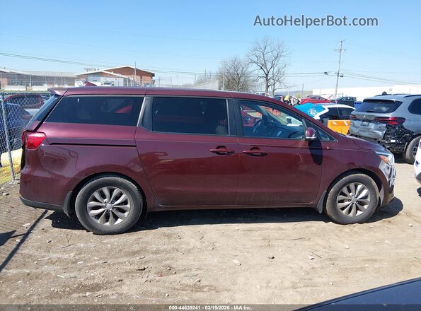 KNDMB5C14K6533501 2019 KIA SEDONA Maroon Rear interior view