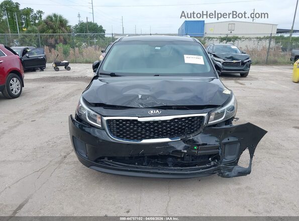 KNDMB5C17H6319952 2017 KIA SEDONA Black ხელსაწყოთა პანელის ხედი