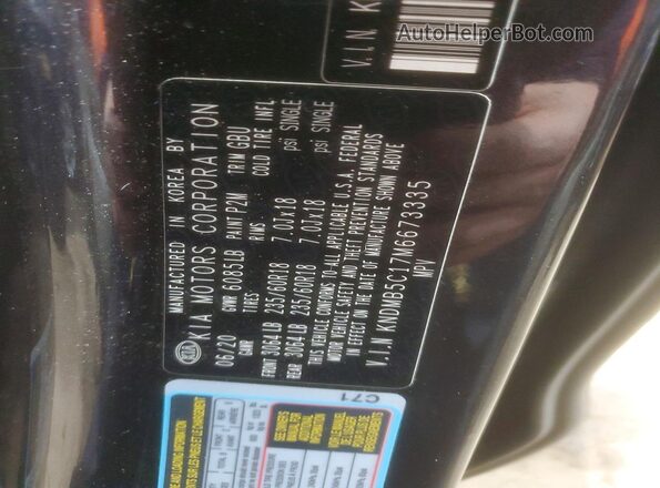 KNDMB5C17M6673335 2021 KIA SEDONA Charcoal Vista de la etiqueta del VIN