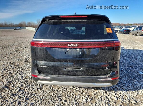 KNDNB4H31P6213729 2023 KIA CARNIVAL Black Rear view