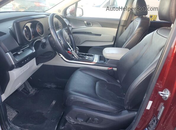 KNDNB4H32P6229034 2023 KIA CARNIVAL Темно-бордовый Вид салона спереди