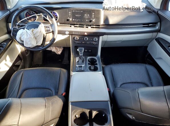 KNDNB4H33N6096037 2022 KIA CARNIVAL Red Widok deski rozdzielczej