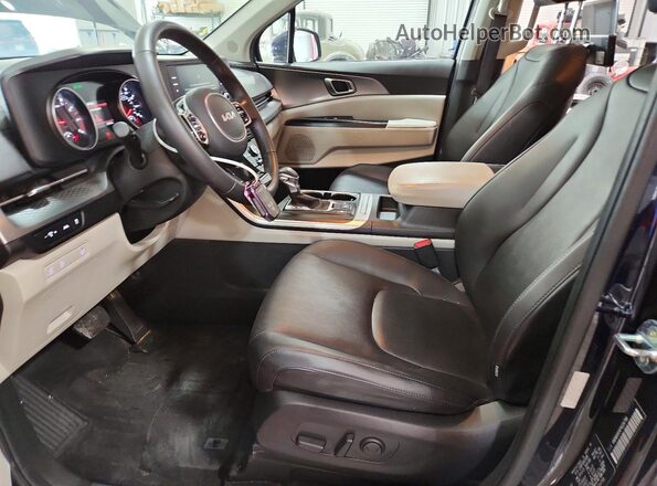 KNDNB4H34P6234798 2023 KIA CARNIVAL Blue Front interior view