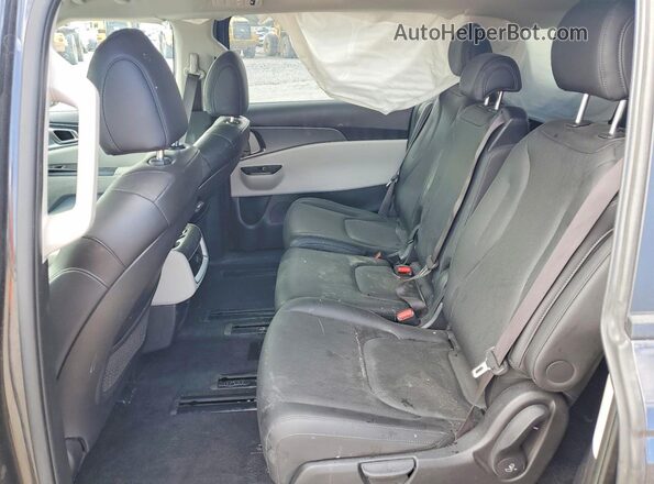 KNDNB4H38R6444937 2024 KIA CARNIVAL Black Widok wnętrza z tyłu