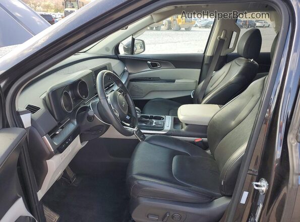 KNDNB4H38R6444937 2024 KIA CARNIVAL Black Widok wnętrza z przodu