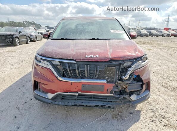 KNDNB4H3XP6249385 2023 KIA CARNIVAL Burgundy Front view