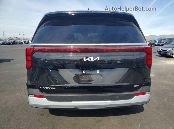 KNDNB5KA2T6092569 2026 KIA CARNIVAL Black Widok z tyłu