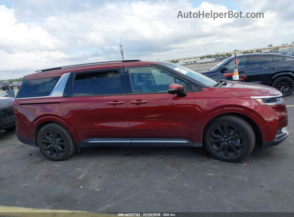 KNDNE5H36P6289721 2023 KIA CARNIVAL MPV Burgundy Вид задньої частини салону