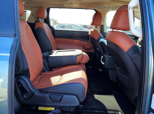 KNDNE5K32T6593387 2026 KIA CARNIVAL Teal Вид задньої частини салону