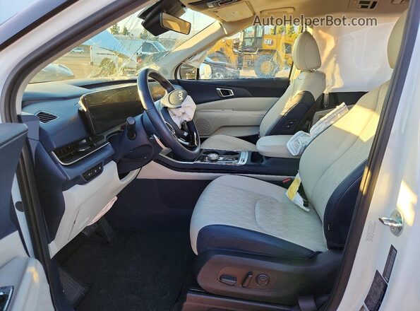 KNDNE5KA1S6060699 2025 KIA CARNIVAL White წინა სალონის ხედი