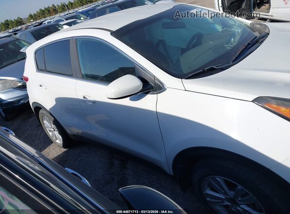 KNDPM3AC7H7237066 2017 KIA SPORTAGE White Vista interior trasera