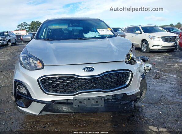 KNDPMCAC2M7916463 2021 KIA SPORTAGE Серебряный Вид задней части салона