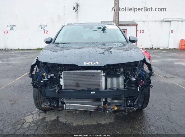 KNDPVCDG1S7201196 2025 KIA SPORTAGE HYBRID Black Rear interior view