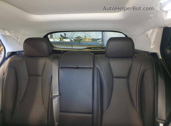LRBFZME46RD056970 2024 BUICK ENVISION Gray Vista de los asientos traseros