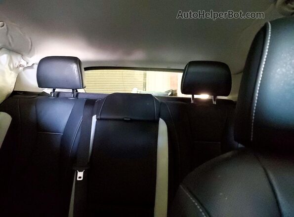 LRBFZPE41RD022422 2024 BUICK ENVISION Black Widok tylnych siedzeń