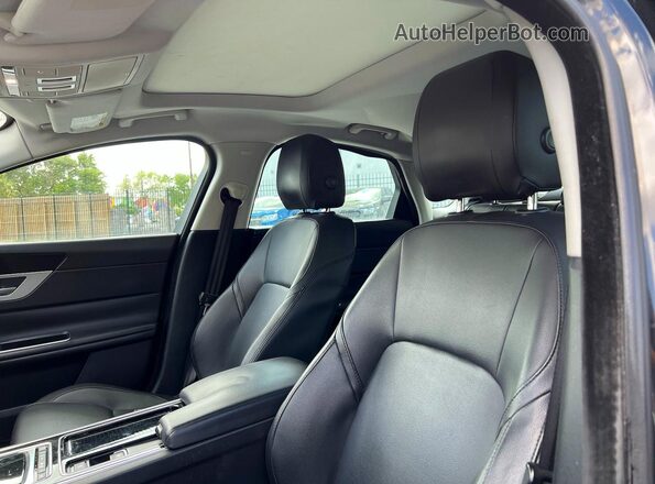 SAJBD4BV9GCY06832 2016 JAGUAR XF Black Rear interior view