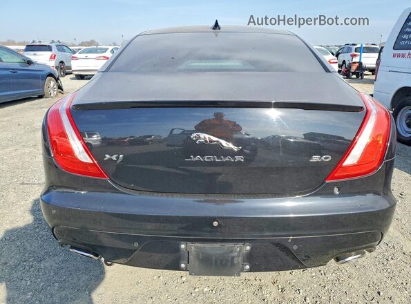 SAJWA1C71H8W06895 2017 JAGUAR XJ Black უკანა ხედი