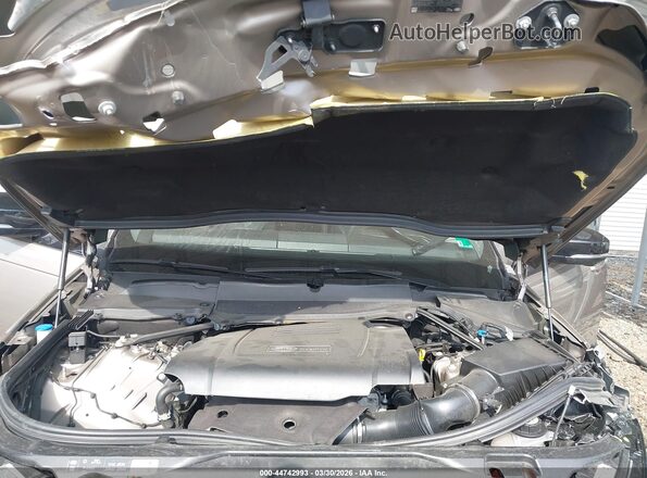 SALRL2EX6R2491992 2024 LAND ROVER DISCOVERY Tan Vista trasera