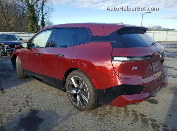 WB523CF00RCS04507 2024 BMW IX Maroon Rear left