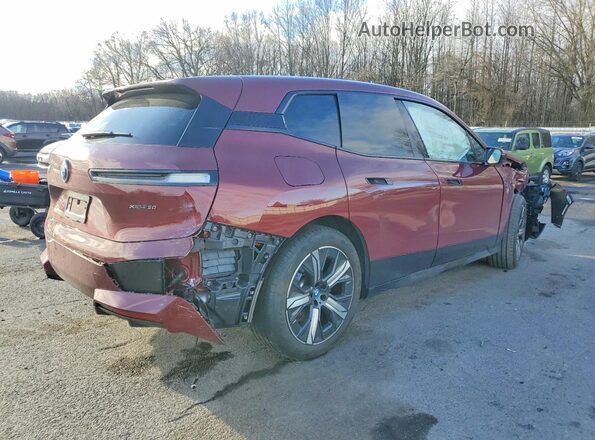 WB523CF00RCS04507 2024 BMW IX Maroon Rear right