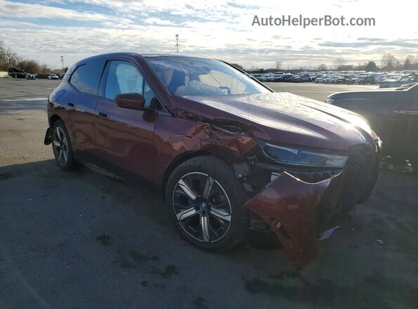 WB523CF00RCS04507 2024 BMW IX Maroon Front right