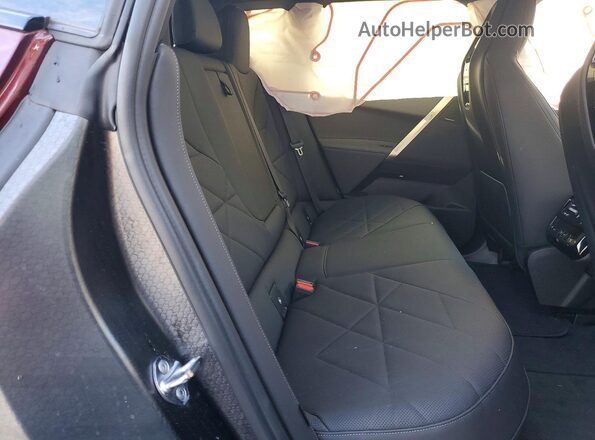 WB523CF00RCS04507 2024 BMW IX Maroon Rear seats view
