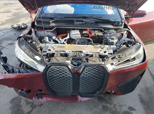 WB523CF00RCS04507 2024 BMW IX Maroon Rear interior view