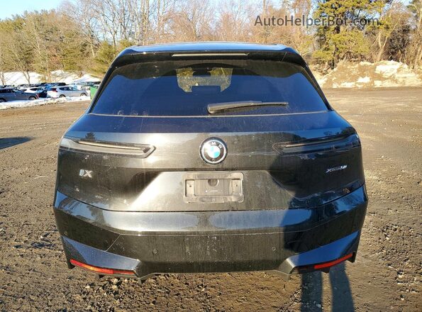 WB523CF02SCS88268 2025 BMW IX Black Հետևի տեսք