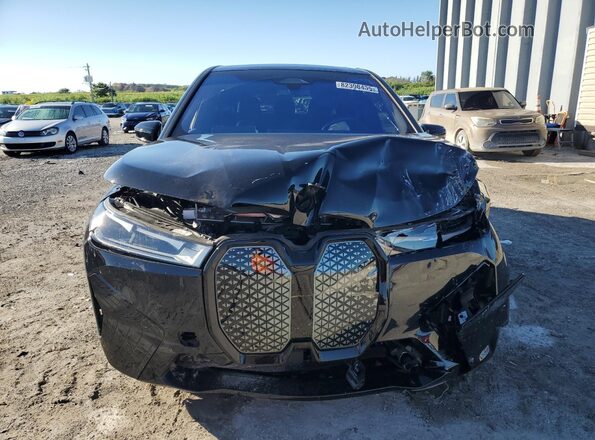 WB523CF02SCT46332 2025 BMW IX Black Դիմացի տեսք