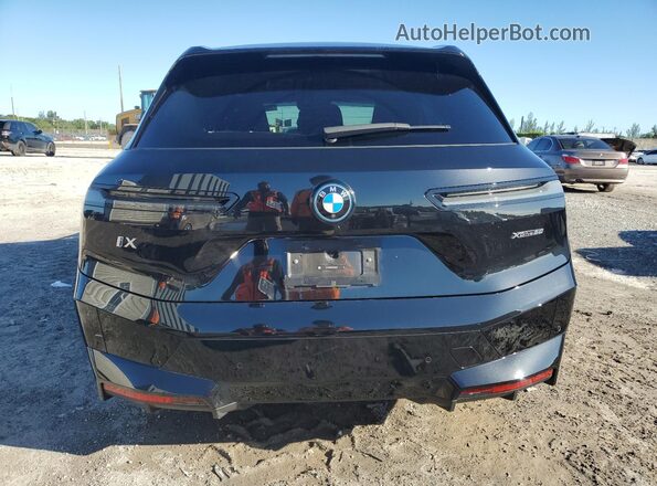 WB523CF02SCT46332 2025 BMW IX Black Հետևի տեսք