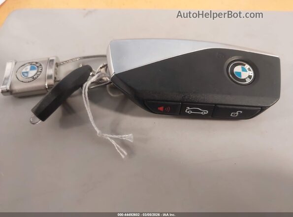 WB523CF02SCU47905 2025 BMW IX Blue Widok deski rozdzielczej