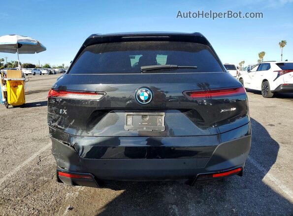 WB523CF04RCN93006 2024 BMW IX Black Հետևի տեսք