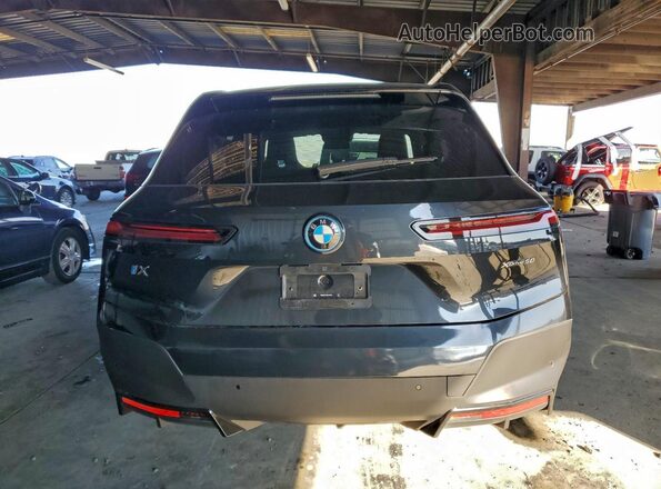 WB523CF05RCP95420 2024 BMW IX Black Հետևի տեսք