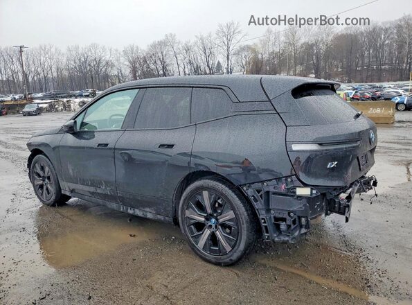 WB523CF06RCR64893 2024 BMW IX Черный Задняя левая четверть