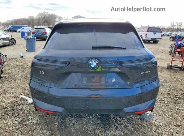 WB523CF07RCP98884 2024 BMW IX Black Rear view