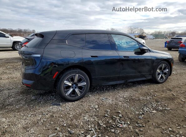 WB523CF07RCP98884 2024 BMW IX Black Rear right