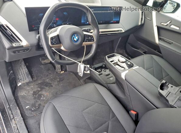 WB523CF08RCR16702 2024 BMW IX Black Dashboard view
