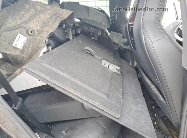 WB523CF08RCR16702 2024 BMW IX Black Rear interior view