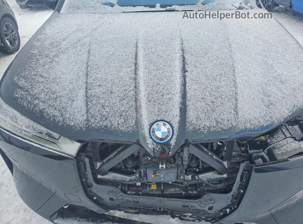 WB523CF08RCR20829 2024 BMW IX Black Vista del compartimento del motor