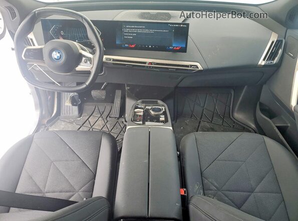 WB523CF08RCR20829 2024 BMW IX Black Vista del salpicadero