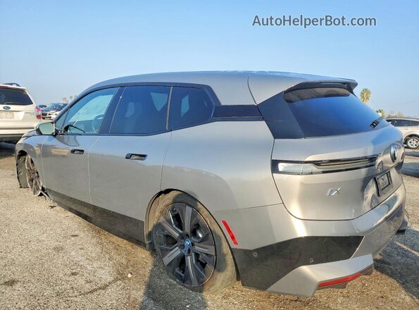WB523CF0XSCS20574 2025 BMW IX Серый Задняя левая четверть