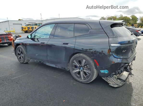 WB533CF04SCT56283 2025 BMW IX Charcoal Հետևի ձախ