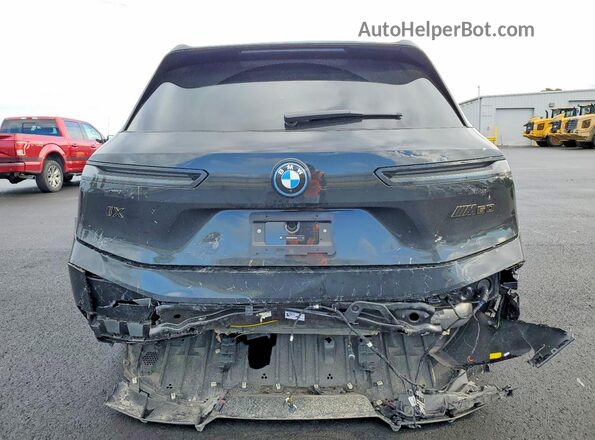 WB533CF04SCT56283 2025 BMW IX Charcoal Հետևի տեսք