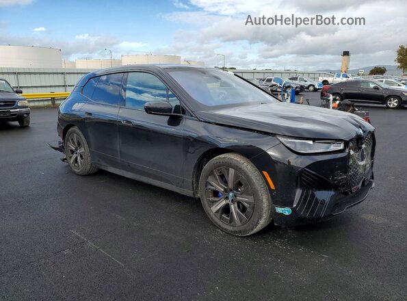 WB533CF04SCT56283 2025 BMW IX Charcoal Առջևի աջ