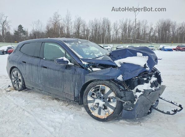 WB543CF07TCV41501 2026 BMW IX Синий Передняя правая четверть
